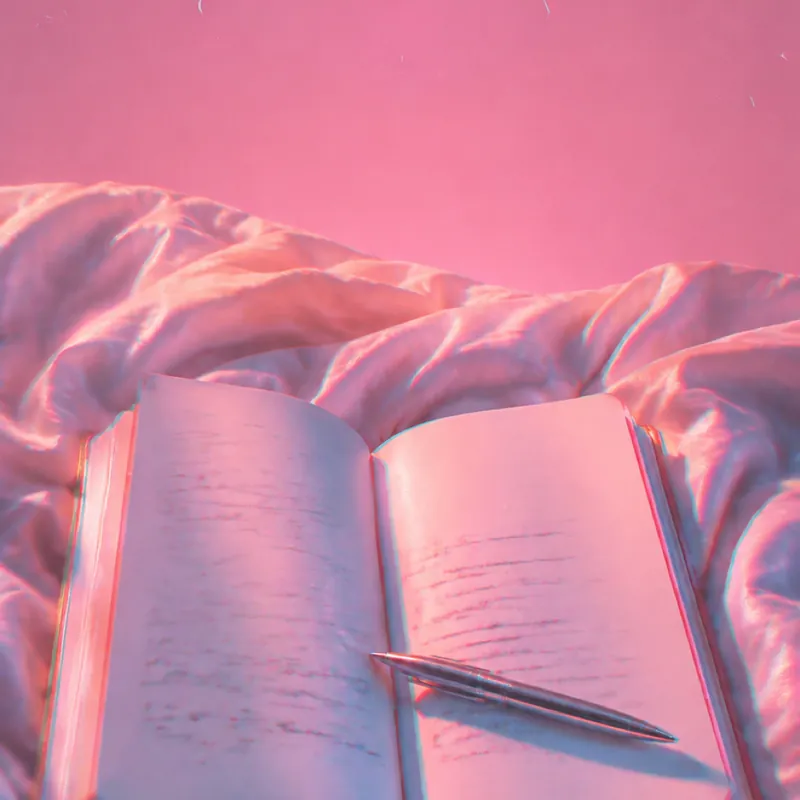 AI b-roll for a short: a notebook on the sheets